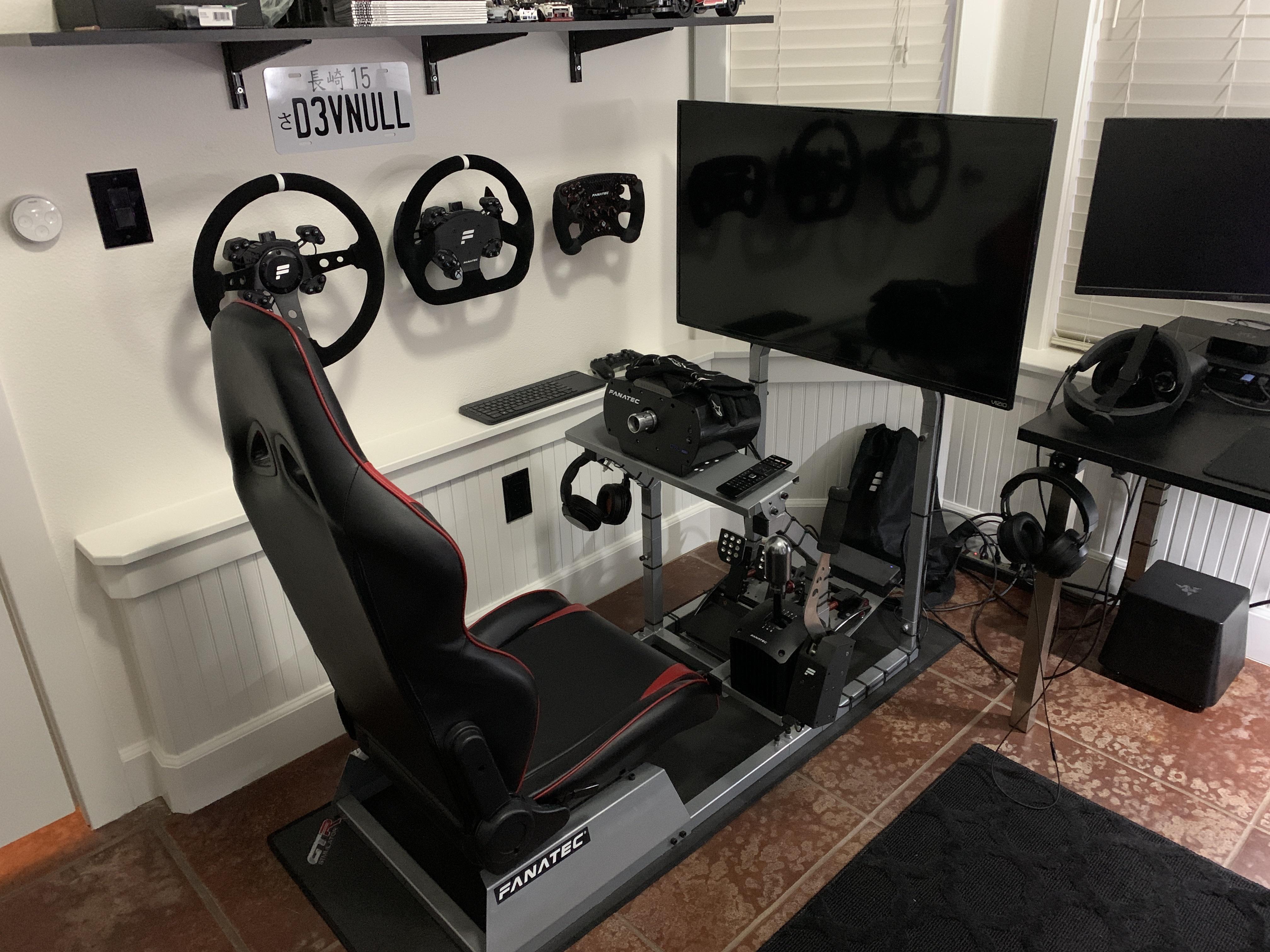 Image of the sim racing setup in someone's home with the wheelbase directly bolt the to a surface.
