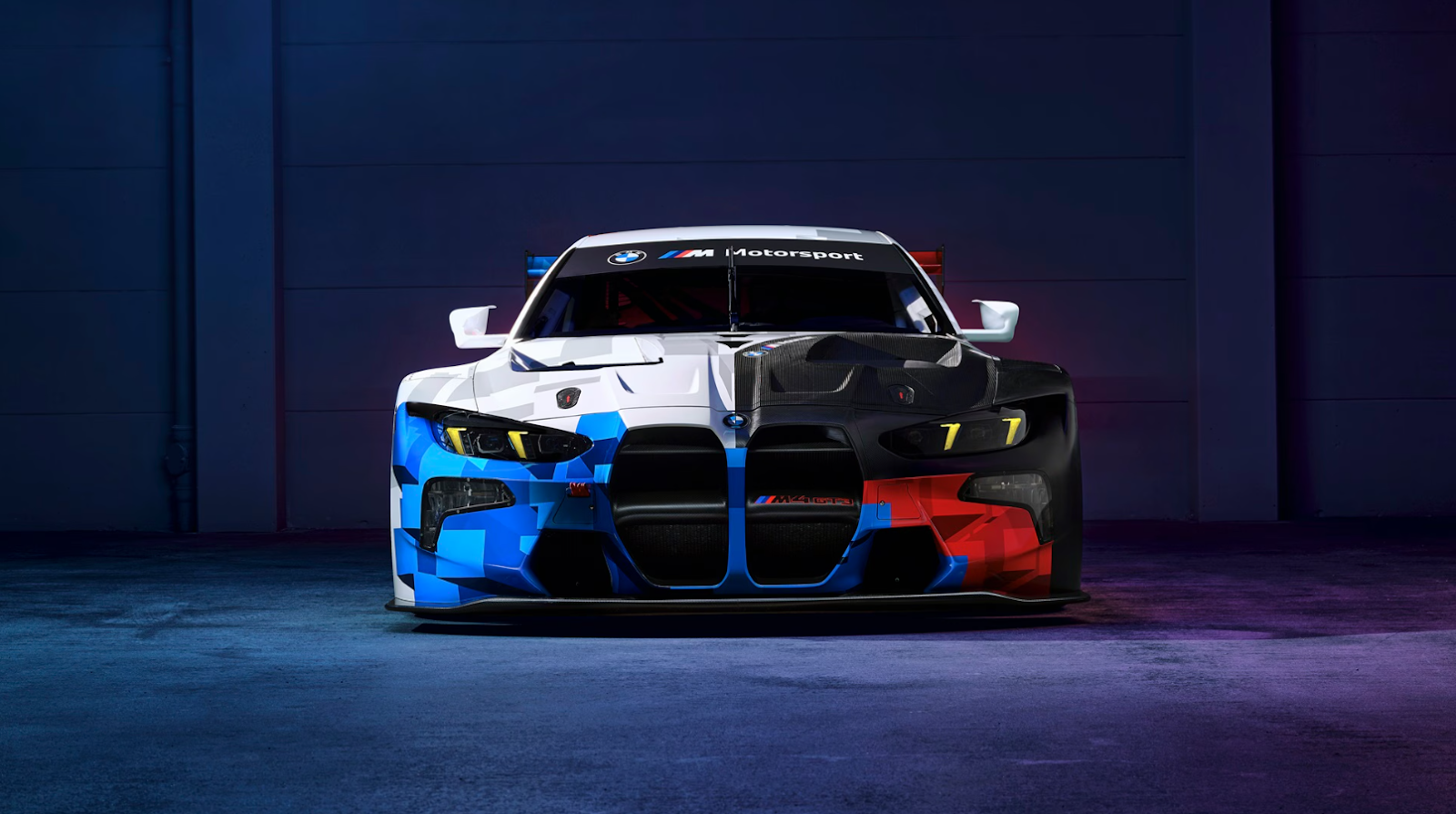 Blue, white, and red BMW M3 GT3 Evo car